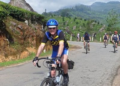 David Mitchell Cycling on the  tour with redspokes